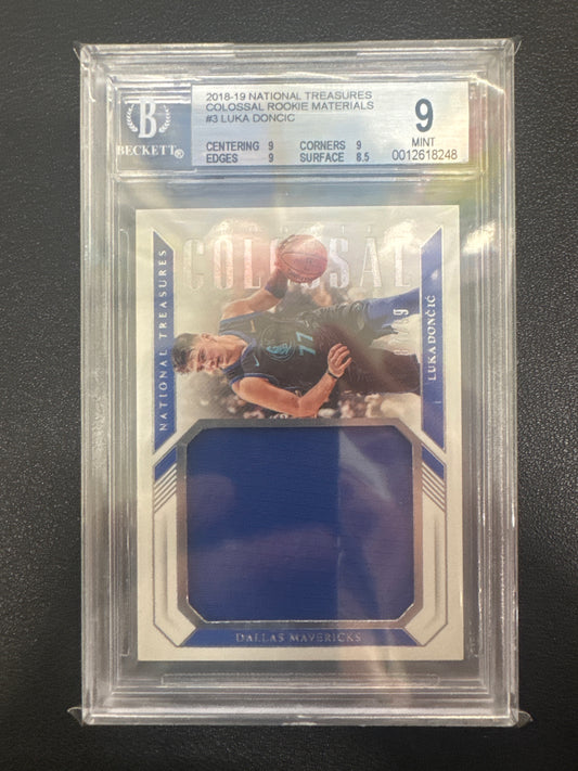 2018-19 Panini National Treasures Luka Doncic Colossal Rookie Materials /99 BGS 9