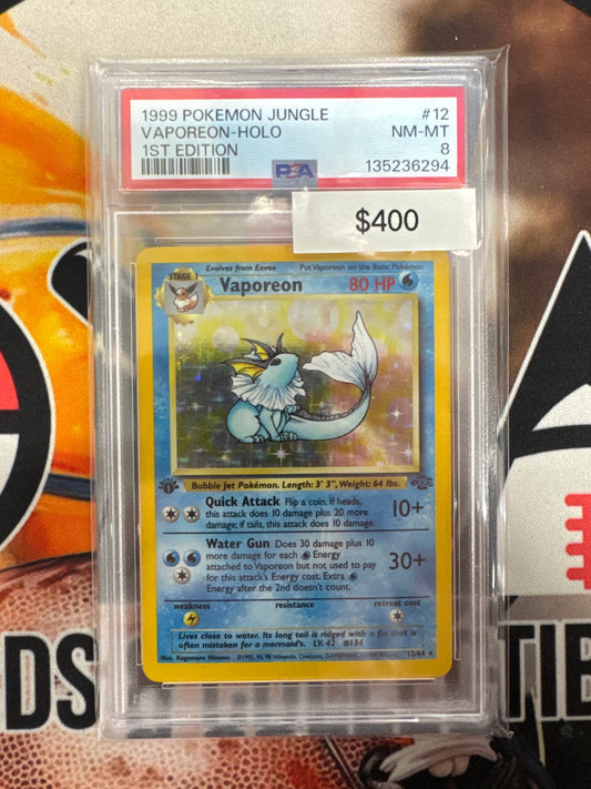 Pokémon 1st Edition Vaporeon Holo Jungle 12/64 PSA 8