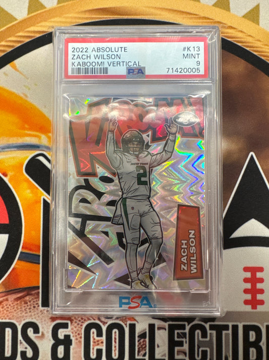 2022 Panini Absolute NFL Zach Wilson Kaboom! Vertical PSA 9