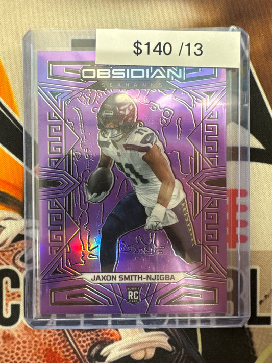 2023 Panini Obsidian NFL Jaxson Smith-Njigba Rookie Purple Flood Refractor /13