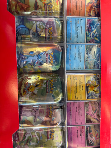 Pokemon Prismatic Evolutions mini tin collection box