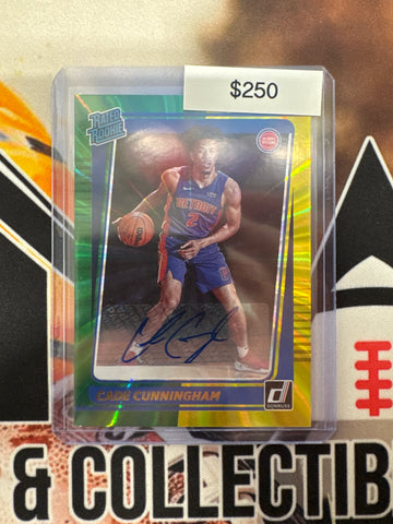 2021-22 Panini Donruss NBA Cade Cunningham Rated Rookie Yellow/Green Lazer Autograph